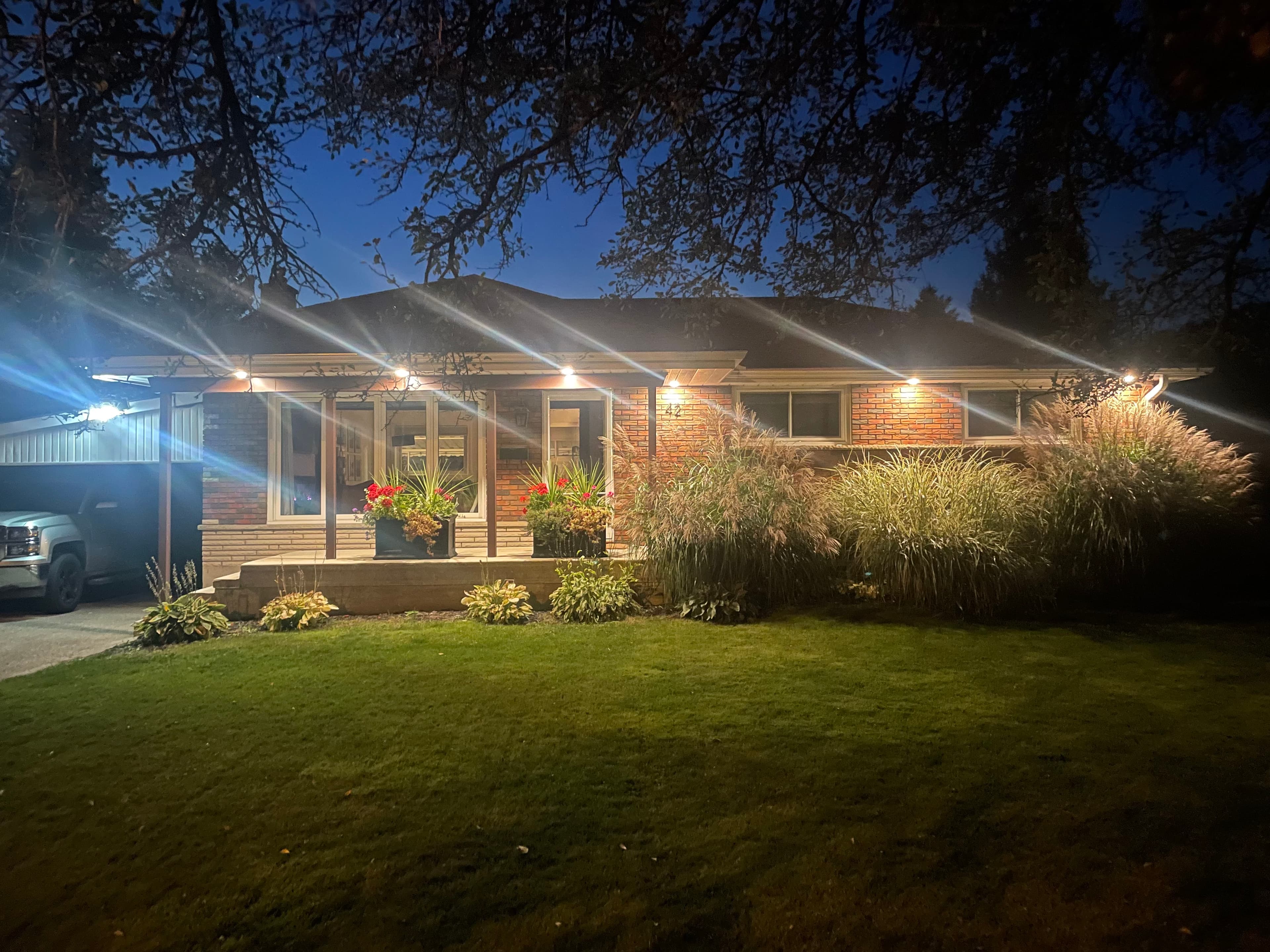 Residential exterior lighting installed by Mikaly Electric on a home near Brantford